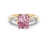 Fancy Pink Radiant Cut Diamond Solitaire Ring Set in Yellow gold with Tapered Baguette Side Stones and Prong Setting
