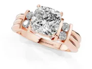 Three-Stone Cushion Cut Diamond Channel Set Ring Set in Rose gold with Bar Prongs