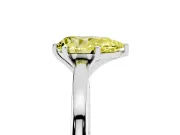 Fancy Yellow Pear Cut Diamond Solitaire Engagement Ring Set in Platinum with Prong Setting on a Classic Band