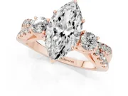 Marquise Cut Diamond Three-Stone Ring Set in Rose gold with Pavé Split Shank and Prong Setting