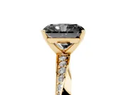 Fancy Black Radiant Cut Diamond Engagement Ring Set in Yellow gold with Side Stone Accents and Prong Setting