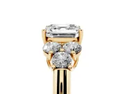 Asscher Cut Diamond Cluster Ring Set in Yellow gold with Round Accent Stones and Prong Setting on a Plain Band