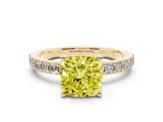 Fancy Yellow Cushion Cut Diamond Solitaire Set in Yellow gold with Round Pavé Band and Prong Setting