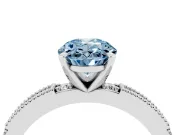 Fancy Blue Oval Cut Diamond Solitaire Ring Set in Silver with Slim Pavé Band and Prong Setting