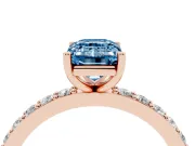 Fancy Blue Emerald Cut Diamond Solitaire Set in Rose gold with Round Pavé Band and Prong Setting