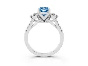 Fancy Blue Three-Stone Cushion Cut Diamond Pavé Band Ring Set in White gold with Prong-Set Trio