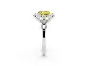 Fancy Yellow Radiant Cut Diamond Floral Halo Ring Set in White gold with Shared Prong Band