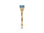 Fancy Blue Cushion Cut Diamond Solitaire Ring Set in Yellow gold with Twisted Band and Bead Prong Setting