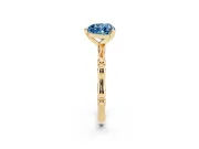 Fancy Blue Heart Cut Diamond Solitaire Ring Set in Yellow gold with Bamboo Band and Prong Setting
