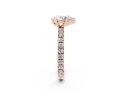 Pear Cut Diamond Pavé Solitaire Ring Set in Rose gold with Round Band and Prong Setting