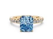 Fancy Blue Radiant Cut Diamond Pavé Solitaire Ring Set in Yellow gold with Round Band and Prong Setting
