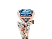 Fancy Blue Princess Cut Diamond Solitaire Ring Set in Rose gold with Marquise Twist Band and Prong Setting