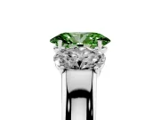 Fancy Green Three-Stone Oval Cut Diamond Ring Set in Platinum with Matching Prong Settings and Plain Band