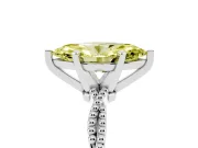 Fancy Yellow Marquise Cut Diamond Solitaire Ring Set in Platinum with Twisted Band and Bead Prong Setting