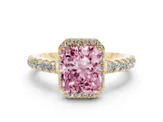 Fancy Pink Radiant Cut Diamond Halo Engagement Ring Set in Yellow gold with Pavé Band and Prong Setting