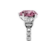 Fancy Pink Heart Cut Diamond Three-Stone Ring Set in White gold with Pavé Band and Graduated Sides
