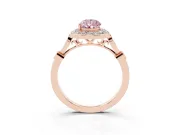 Fancy Pink Pear Cut Diamond Halo Engagement Ring Set in Rose gold with Twisted Band and Prong Setting