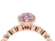 Fancy Pink Marquise Cut Diamond Solitaire Engagement Ring Set in Rose gold with Bezel Accents on Beaded Band