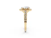 Oval Cut Diamond Milgrain Halo Solitaire Ring Set in Yellow gold with Bezel Set Side Stones and Pavé Band