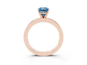 Fancy Blue Radiant Cut Diamond Solitaire Ring Set in Rose gold with Channel-Set Baguette Band and Prong Setting
