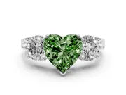 Fancy Green Heart Cut Diamond Three-Stone Ring Set in Platinum with Milgrain Band