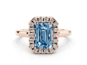 Fancy Blue Emerald Cut Halo Round Diamond Solitaire Ring Set in Rose gold with Pavé Band and Prong Setting