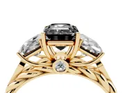 Fancy Black Emerald Cut Diamond Three-Stone Ring Set in Yellow gold with Braided Band