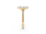 Marquise Cut Diamond Solitaire Engagement Ring Set in Yellow gold with Bezel Accents on Beaded Band