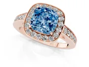 Fancy Blue Cushion Cut Diamond Halo Pavé Engagement Ring Set in Rose gold with Bezel Setting