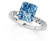 Fancy Blue Radiant Cut Diamond Pavé Solitaire Ring Set in White gold with Round Band and Prong Setting