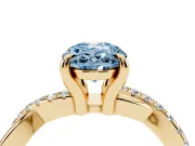 Fancy Blue Oval Cut Diamond Twist Band Solitaire Set in Yellow gold with Pavé Accents and Prong Setting