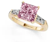 Fancy Pink Princess Cut Diamond Solitaire Ring Set in Yellow gold with Tapered Baguette Side Stones and Prong Setting