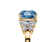 Fancy Blue Princess Cut Diamond Solitaire Floral Ring Set in Yellow gold with Marquise Petals and Prong Setting