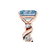 Fancy Blue Emerald Cut Diamond Solitaire Ring Set in Rose gold with Ribbon Twist Band, Round Accents and Prong Setting