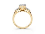 Heart-Shaped Three-Stone Engagement Ring Setting | Pear Side Stones | Yellow Gold