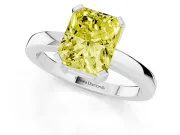 Fancy Yellow Radiant Cut Diamond Solitaire Ring Set in White gold with Prong Head and Smooth Polished Band