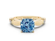 Fancy Blue Cushion Cut Diamond Solitaire Twisted Band Ring Set in Yellow gold with Accent Stones and Prong Setting