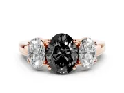 Fancy Black Oval Cut Diamond Three-Stone Ring Set in Rose gold with Polished Band and Prong Setting