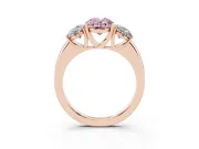 Fancy Pink Oval Cut Diamond Three-Stone Ring Set in Rose gold with Bold Center and Classic Band