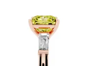 Fancy Yellow Princess Cut Diamond Solitaire Ring Set in Rose gold with Tapered Baguette Side Stones and Prong Setting