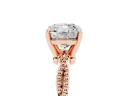 Cushion Cut Diamond Solitaire Ring Set in Rose gold with Twisted Band and Bead Prong Setting