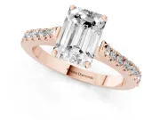 Emerald Cut Diamond Solitaire Engagement Ring Set in Rose gold with Delicate Pavé Band and Prong Setting