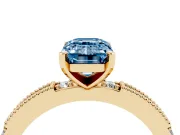 Fancy Blue Emerald Cut Diamond Solitaire Ring Set in Yellow gold with Slim Pavé Band and Prong Setting