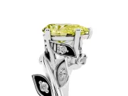 Fancy Yellow Pear Cut Diamond Solitaire Twist Engagement Ring Set in Platinum with Pavé Leaf Accents