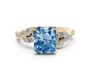 Fancy Blue Radiant Cut Diamond Solitaire Ring Set in Yellow gold with Marquise Twist Band and Prong Setting