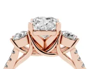 Three-Stone Cushion Cut Diamond Pavé Band Ring Set in Rose gold with Prong-Set Trio