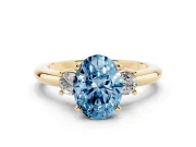 Oval Three Stone Engagement Ring Setting for a Fancy Blue Lab-Grown Diamond | Round Side Stones | Yellow Gold