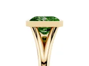 Fancy Green Bezel Set Radiant Cut Diamond Solitaire Ring Set in Yellow gold with Tapered Band