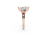 Marquise Cut Diamond Three-Stone Ring Set in Rose gold with Prong Setting and Classic Band