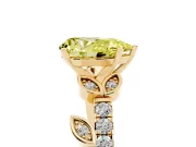 Fancy Yellow Pear Cut Diamond Solitaire Leaf-Inspired Ring Set in Yellow gold with Pavé Band and Prong Setting